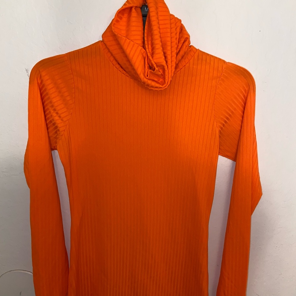 Orange turtleneck